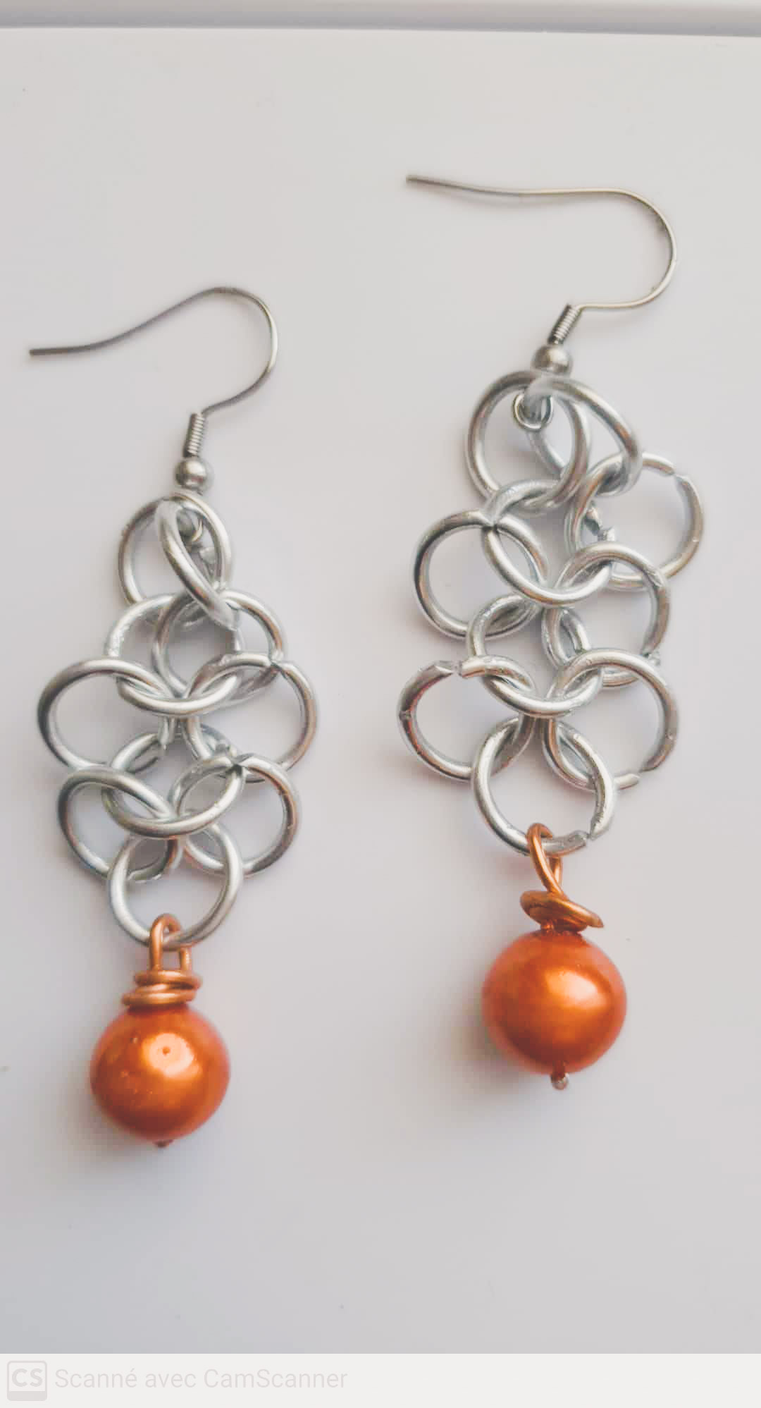 Boucles d'oreilles couleurs argent et orange